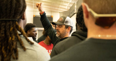 PSU football gets off field, into community